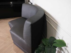 Curved sofa, covered with silk leather, wooden frame, black
