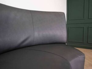 Curved sofa, covered with silk leather, wooden frame, black