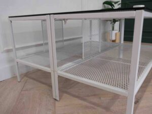 glass center table Center table, steel frame, with shelves under the table.