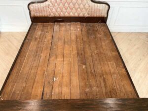6-foot wooden bed, fabric-covered headboard, with storage cabinet at the end of the bed