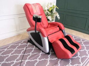 Massage chair, reclining, electric system, red leather seats, Makoto brand.