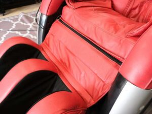 Massage chair, reclining, electric system, red leather seats, Makoto brand.