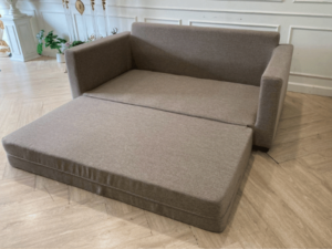 2-seat sofa bed, fabric cushions with pillows