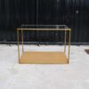Product display shelf Product shelves, glass top, gold-colored steel frame brown wooden base