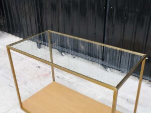 Product display shelf Product shelves, glass top, gold-colored steel frame brown wooden base