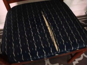 Teak frame chair blue cloth cushion