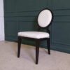 dining chair White leather seats, black wood frame.