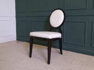 dining chair White leather seats, black wood frame.