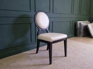 dining chair White leather seats, black wood frame.