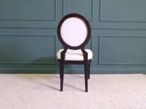 dining chair White leather seats, black wood frame.