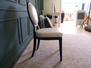 dining chair White leather seats, black wood frame.