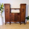 Wooden cabinet, walnut color, European workmanship, sourced from Germany.