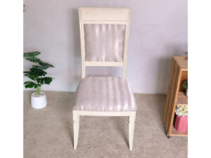 Wooden chair, purple cloth cushion with straight pattern, beautiful frame, cushioned backrest.
