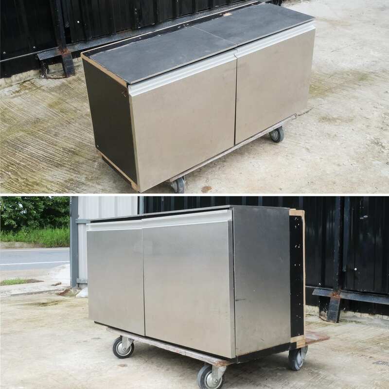 Multi-purpose storage cabinet, low shape, made from wood with stainless steel panels on the outside.