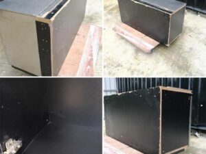 Multi-purpose storage cabinet, low shape, made from wood with stainless steel panels on the outside.