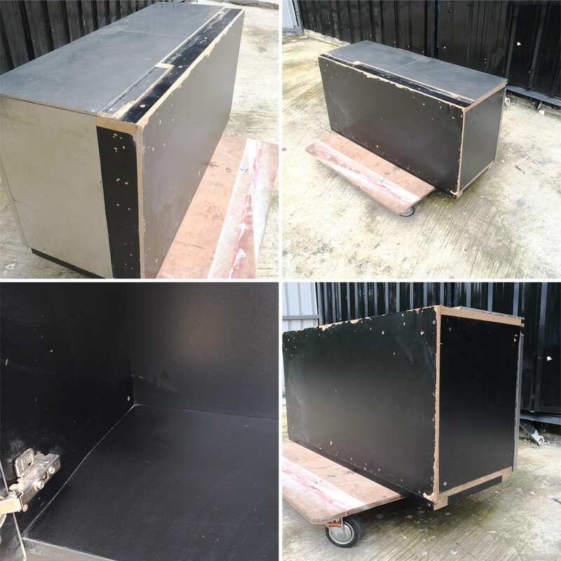 Multi-purpose storage cabinet, low shape, made from wood with stainless steel panels on the outside.