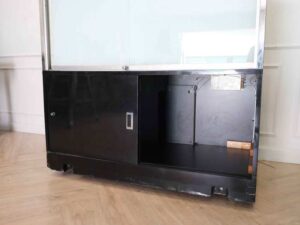 Jewelry showcase cabinet, display showcase cabinet, display cabinet, black wooden frame, white display base, 2 sliding doors, with wheels.