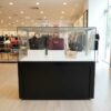 Jewelry showcase cabinet, display showcase cabinet, display cabinet, black wooden frame, white display base, 2 sliding doors, with wheels.