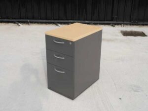 Gray wooden filing cabinet with 3 drawers, cream colored wood top. (no wheels/no key)