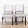 Gray silk leather chair, wooden frame, riveted backrest and seat.