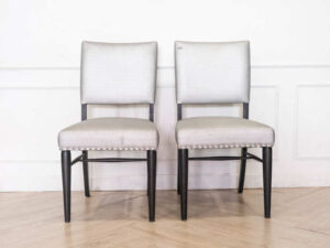 Gray silk leather chair, wooden frame, riveted backrest and seat.