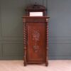 Tall wooden storage cabinet, vintage style, European made from Germany.