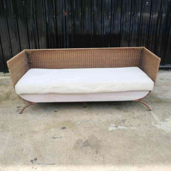 Rattan sofa, white cushion, modern design.