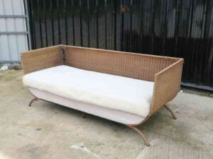 Rattan sofa, white cushion, modern design.