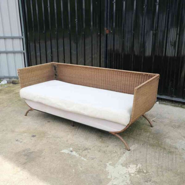 Rattan sofa, white cushion, modern design.