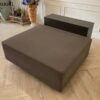 Square sofa, leather seat, wooden frame, gray color.