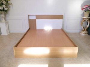 Bed base 5 feet, wooden frame, brown, white headboard.