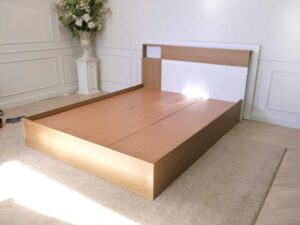 Bed base 5 feet, wooden frame, brown, white headboard.