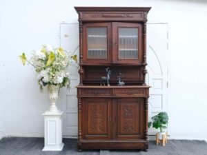 Classic style storage cabinet, carved wood, glass top, European craftsmanship, sourced from Germany.