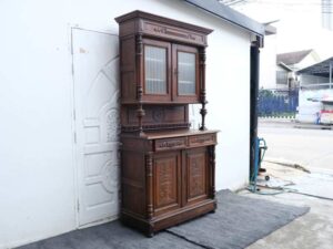 Classic style storage cabinet, carved wood, glass top, European craftsmanship, sourced from Germany.