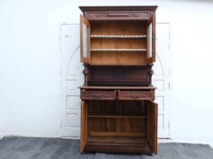 Classic style storage cabinet, carved wood, glass top, European craftsmanship, sourced from Germany.
