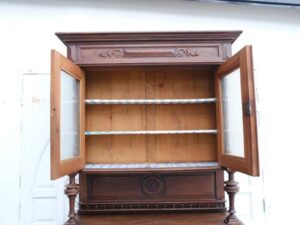 Classic style storage cabinet, carved wood, glass top, European craftsmanship, sourced from Germany.