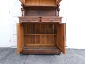 Classic style storage cabinet, carved wood, glass top, European craftsmanship, sourced from Germany.