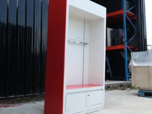 Wooden product shelf, hanging rail type, adjustable, red-white wooden frame, has 2 storage drawers.