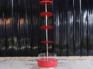 Round shelf, 4 levels, red, 3 levels with a slope in the middle made of steel.