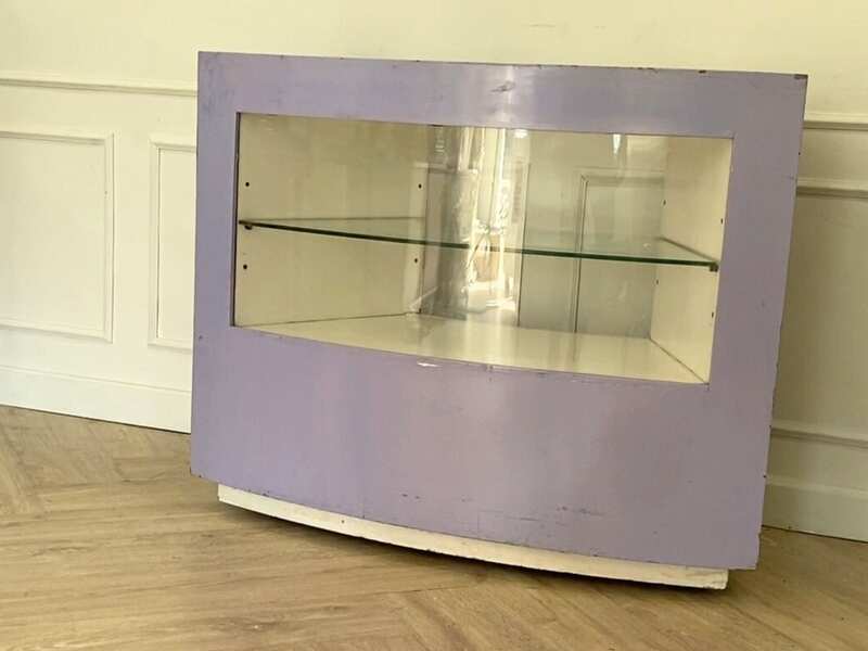 Curved glass jewelry showcase cabinet in purple color, without glass door.