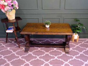 Multi-purpose table wood carving European work comes from Germany.