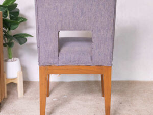 Wooden chair, purple fabric cushion, beautiful frame, cushioned backrest.
