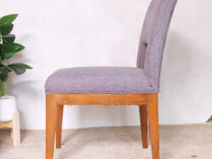 Wooden chair, purple fabric cushion, beautiful frame, cushioned backrest.