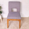 Wooden chair, purple fabric cushion, beautiful frame, cushioned backrest.