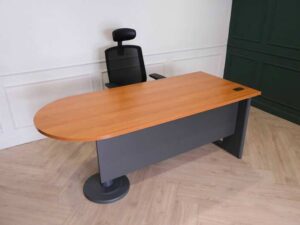 Wooden desk with steel legs, curved front, one side, brand Rockworth._