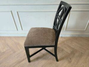 Wooden chair, cream fabric cushion, beautiful black frame.