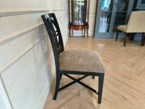 Wooden chair, cream fabric cushion, beautiful black frame.