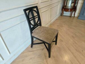Wooden chair, cream fabric cushion, beautiful black frame.