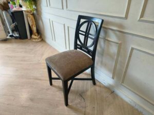 Wooden chair, cream fabric cushion, beautiful black frame.