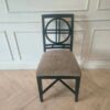 Wooden chair, cream fabric cushion, beautiful black frame.
